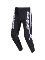 Alpinestars 2026 Fluid Apex Pants, spodnie motocrossowe, czarno-szare, białe pionowe logo astars na nogawkach, ergonomiczny sportowy krój, wytrzymała konstrukcja z poliestru 600D do jazdy terenowej