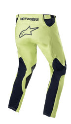 Alpinestars 2023 Racer Hoen Pants, spodnie motocrossowe, kolor zielony fluorite i granatowy, widok z tyłu z neonowo zieloną konstrukcją i granatowymi panelami na nogawkach, duże czarne logo gwiazdy w części siedzącej, ergonomiczna, wstępnie zakrzywiona konstrukcja do jazdy off-road