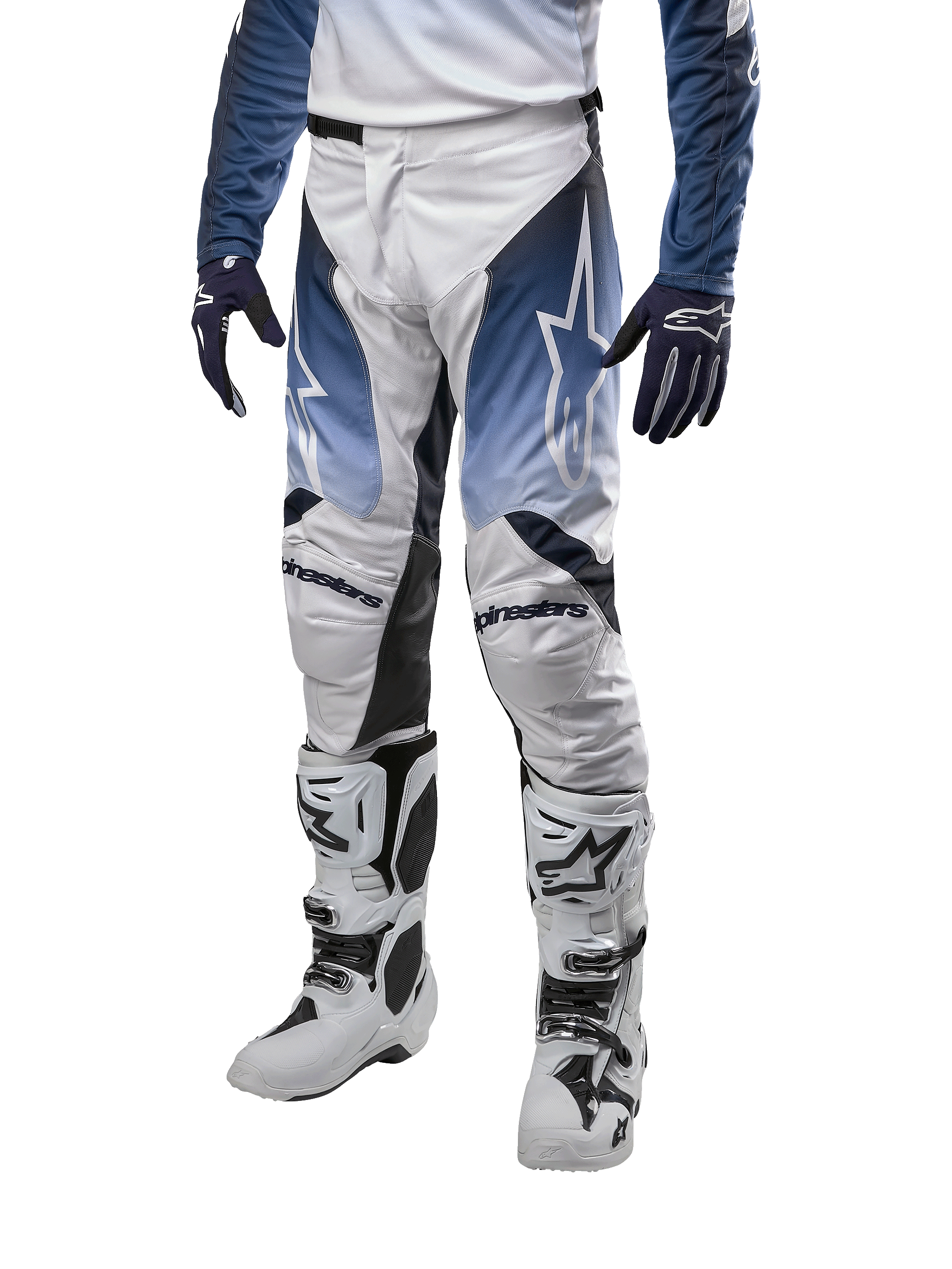 Alpinestars 2024 Racer Hoen Pants, spodnie motocrossowe, białe z ciemnogranatowymi i jasnoniebieskimi akcentami, logo Alpinestars, sportowy krój z wzmocnieniami na kolanach, nowoczesny design off-road