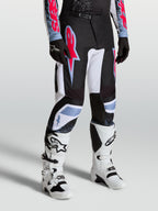 Alpinestars Fluid Drag Pants, men's motocross racing pants in black and white with red fluo and light blue accents.