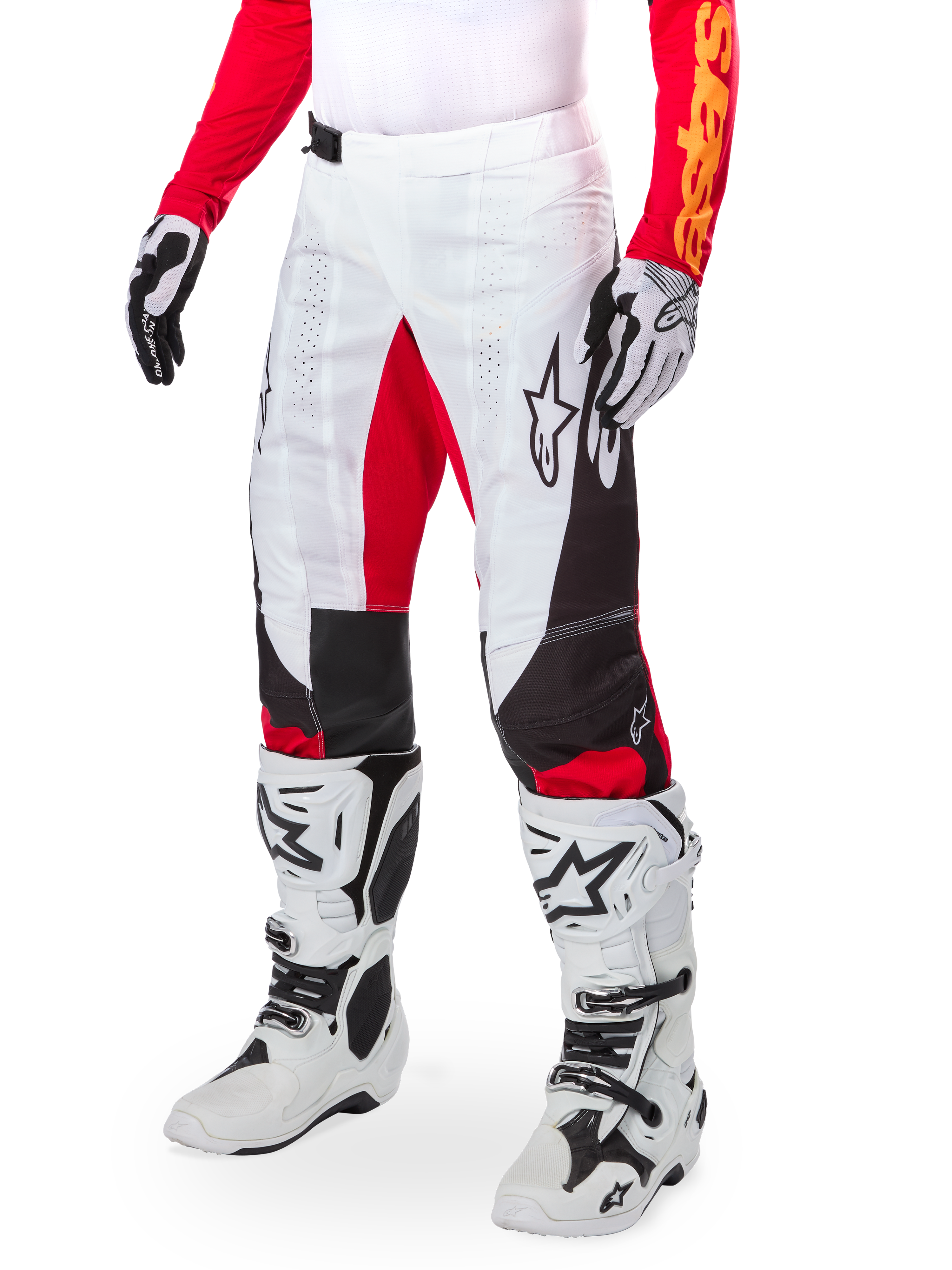 Alpinestars Limited Edition Techstar Deep Pants, Motocross Pants, White Black and High Red, worn with white and black boots and gloves, featuring white front panels with red accents and black side detailing, designed for high-performance off-road racing