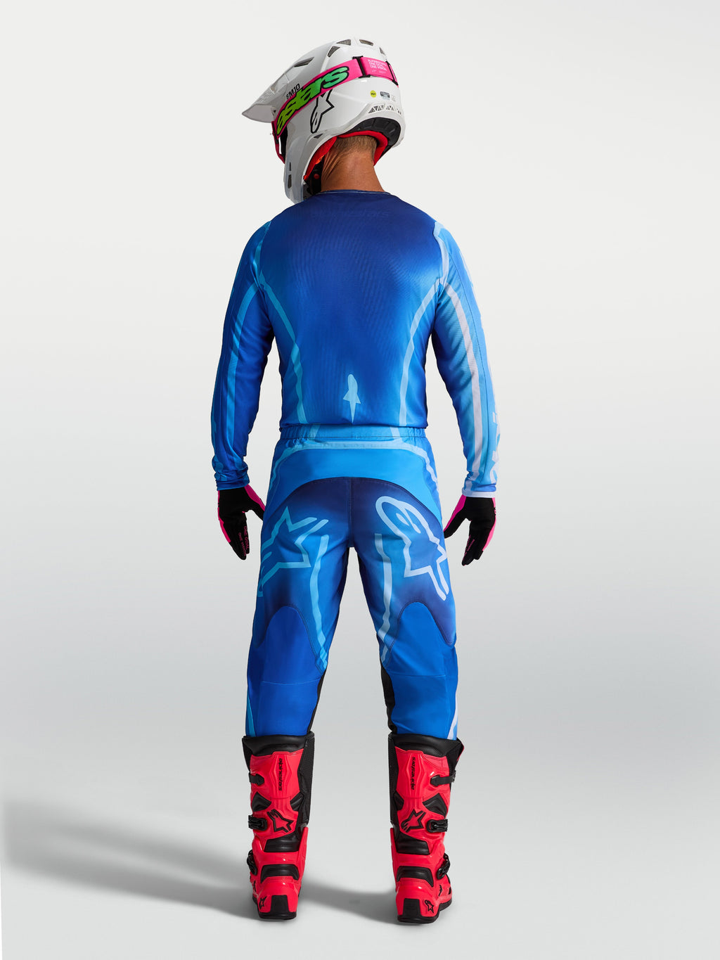 Spodnie Alpinestars Fluid Kepler, męskie spodnie motocrossowe, niebieskie, tył, ergonomiczny krój, trwały poliester 600D.