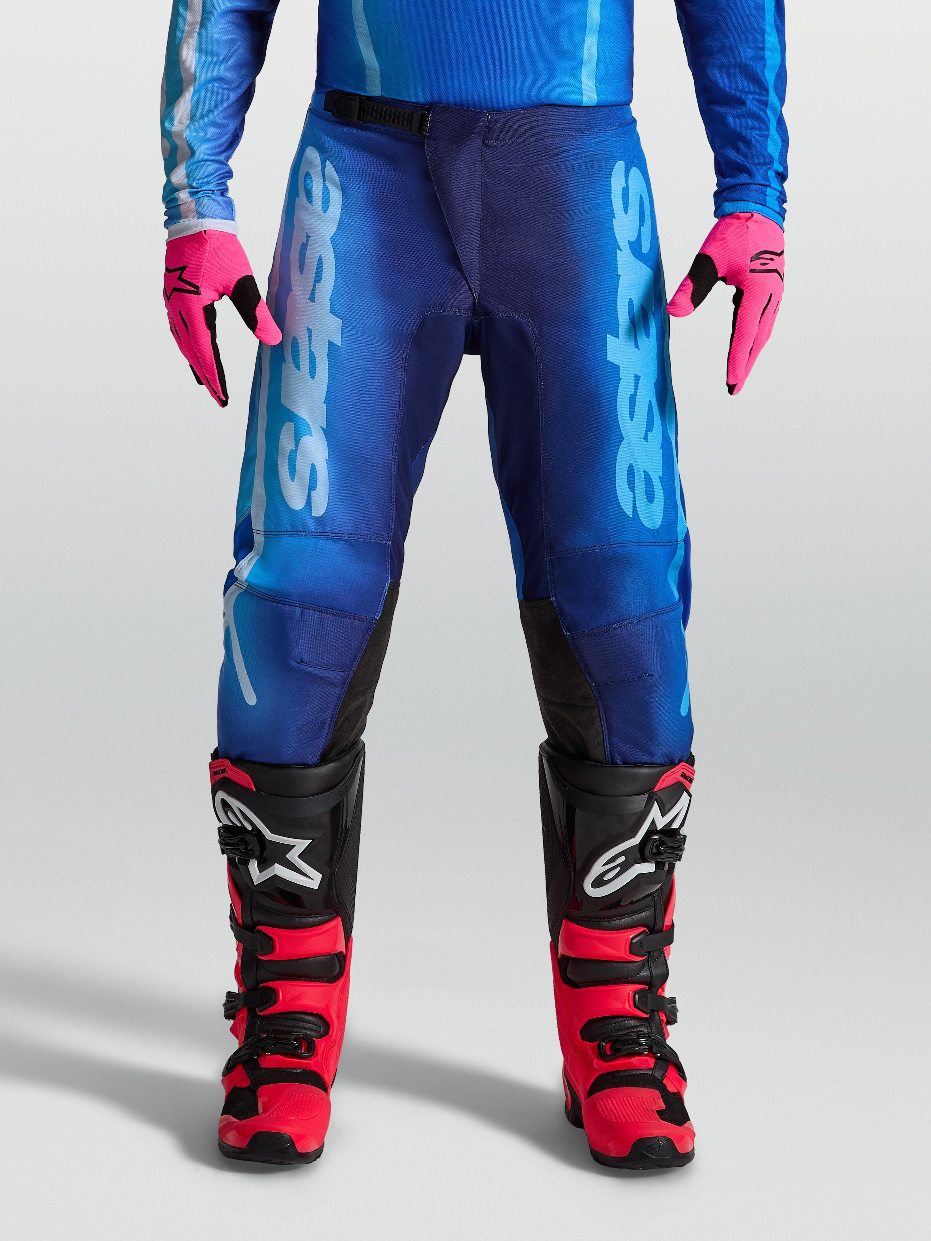 Męskie spodnie motocrossowe Alpinestars Fluid Kepler, niebieskie, lekki poliester 600D i ergonomiczny krój off-road.
