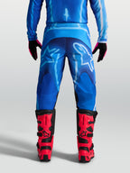 Alpinestars Fluid Kepler, męskie spodnie motocrossowe, niebieskie, widok od tyłu, trwała konstrukcja z poliestru 600D
