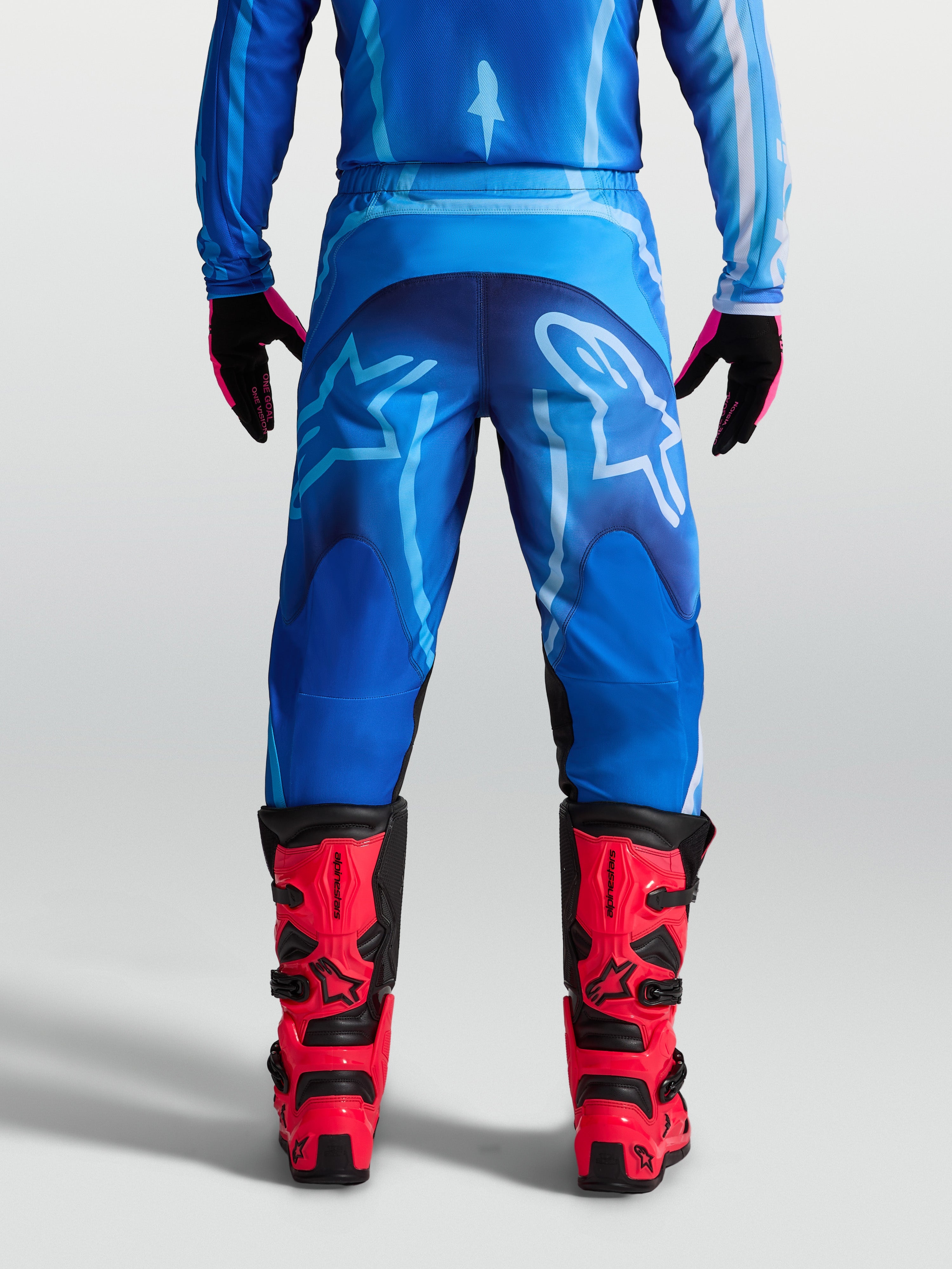 Alpinestars Fluid Kepler, męskie spodnie motocrossowe, niebieskie, widok od tyłu, trwała konstrukcja z poliestru 600D