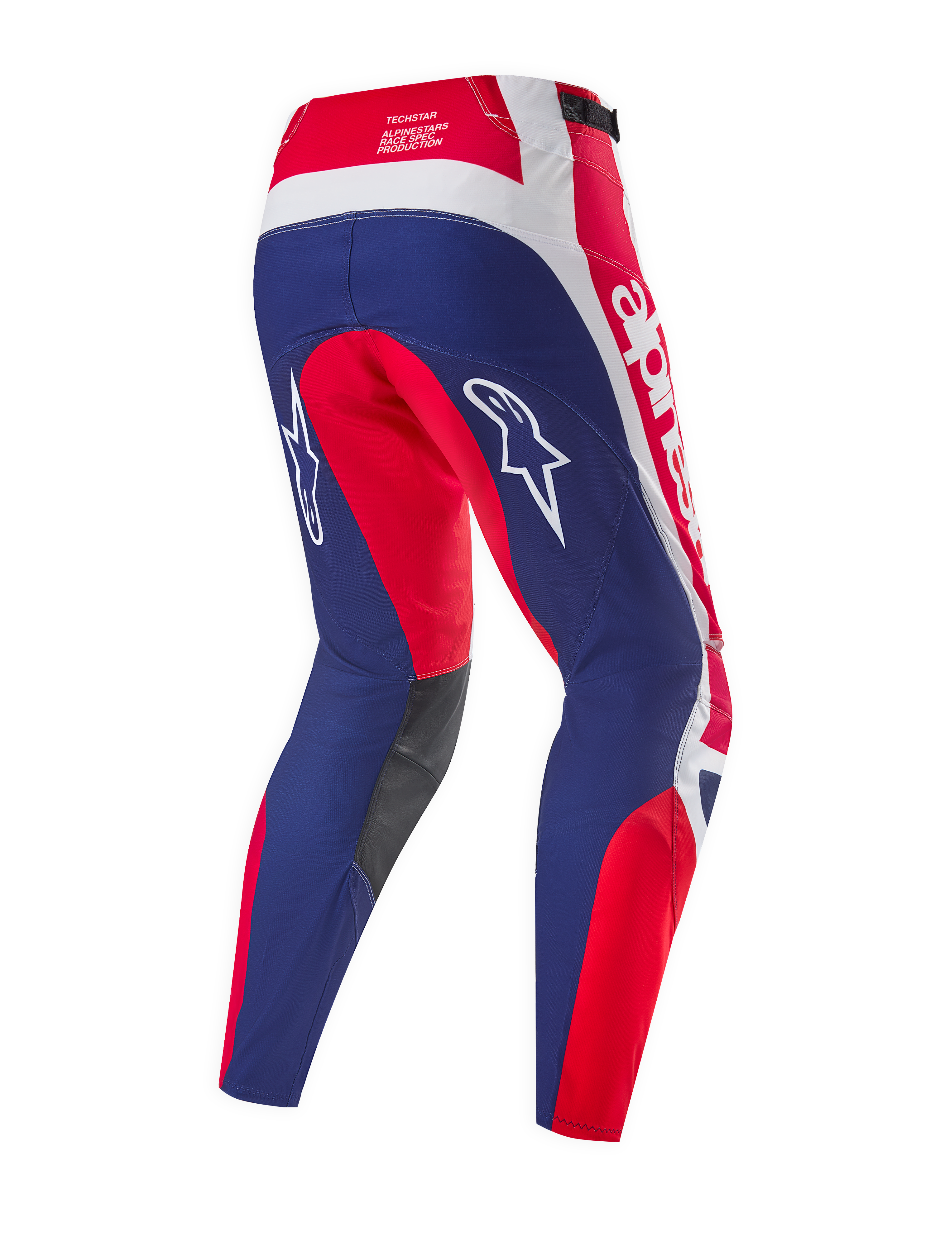 Alpinestars Limited Edition Techstar Fortitude Pants, spodnie motocrossowe, jaskrawoczerwone, białe i niebieskie, widok z tyłu przedstawiający niebieskie panele na siedzeniu i nogawkach z czerwonymi i białymi akcentami, białe logo gwiazdy na udach oraz oznaczenie Techstar race spec w pasie.