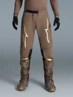 Spodnie Alpinestars Supertech Air Gold Edycja Limitowana, brązowe i złote spodnie motocrossowe z wentylowaną tkaniną rip-stop i logo Astars.