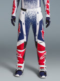 Alpinestars Techstar Unity, męskie spodnie motocrossowe z limitowanej edycji, biało-czerwono-niebieskie, elastyczny materiał.