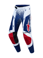 Alpinestars Techstar Unity, męskie spodnie motocrossowe z edycji limitowanej, niebieskie i białe z akcentami czerwonej gwiazdy, skórzane panele na kolanach, wyścigowa odzież off-road