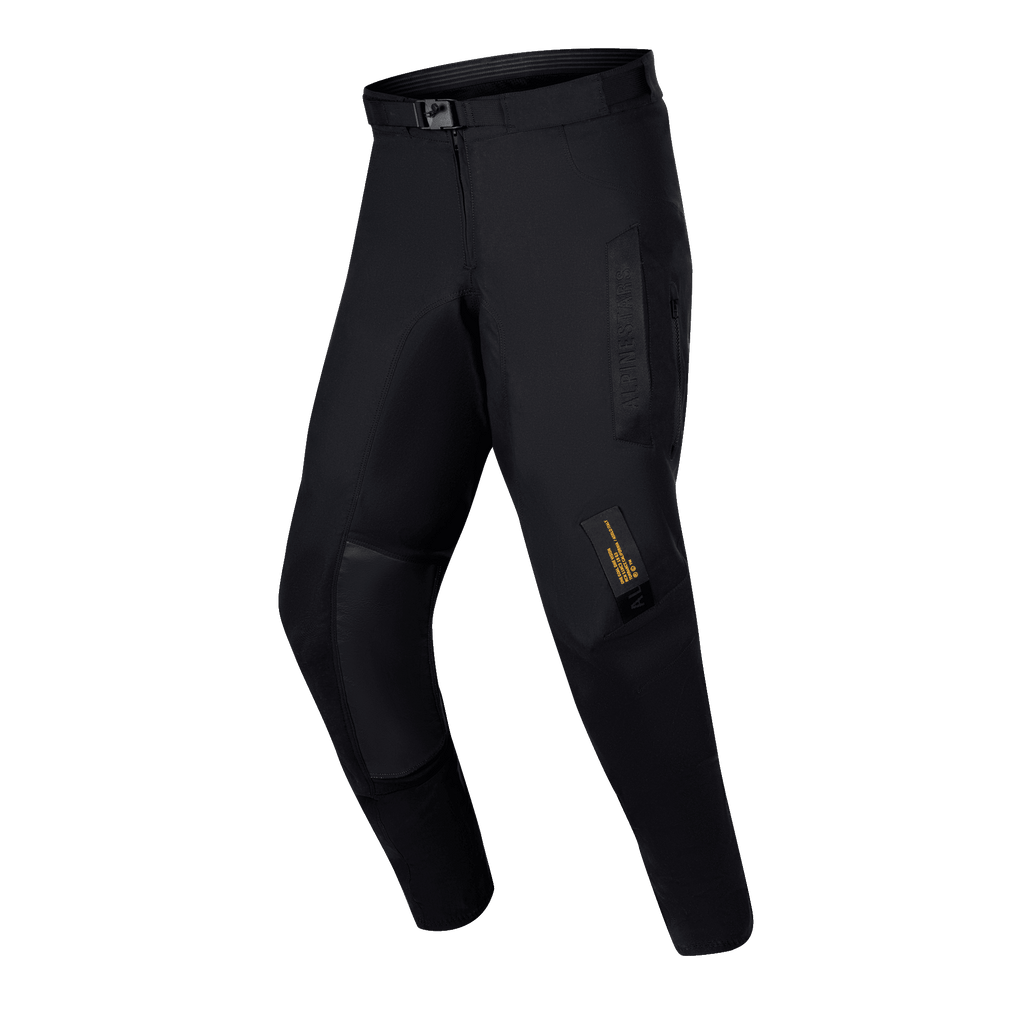 Alpinestars Techdura Pants 2024, spodnie enduro off-road, kolor czarny, wytrzymała konstrukcja z elastycznego poliamidu, panele z koziej skóry na kolanach, pasek z magnetyczną klamrą SX2, techniczne detale brandingowe