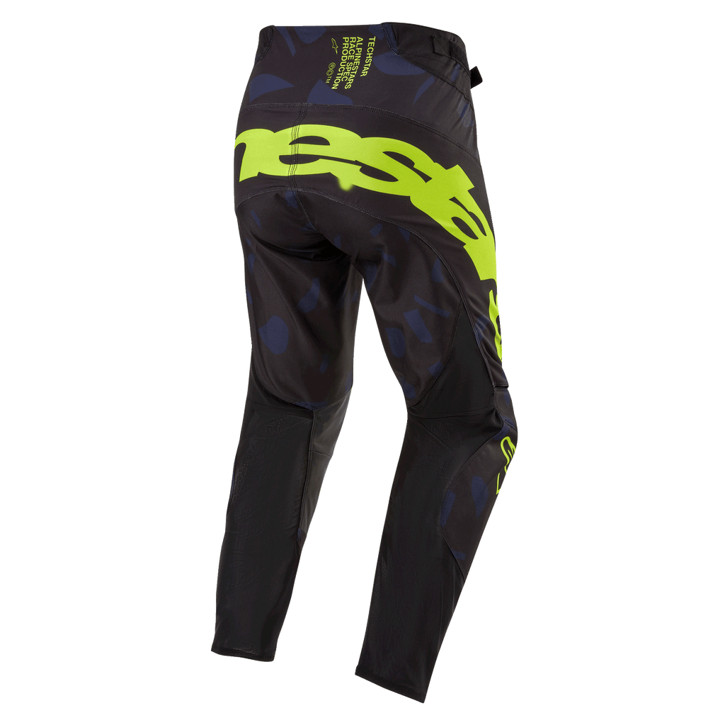 Alpinestars Techstar Rantera Pants 2024, spodnie motocrossowe, czarno-granatowe i żółte fluo, widok z tyłu z wyrazistym żółtym brandingiem na siedzeniu, granatowe wzorzyste panele i czarna tkanina techniczna zapewniająca wydajność w wyścigach terenowych