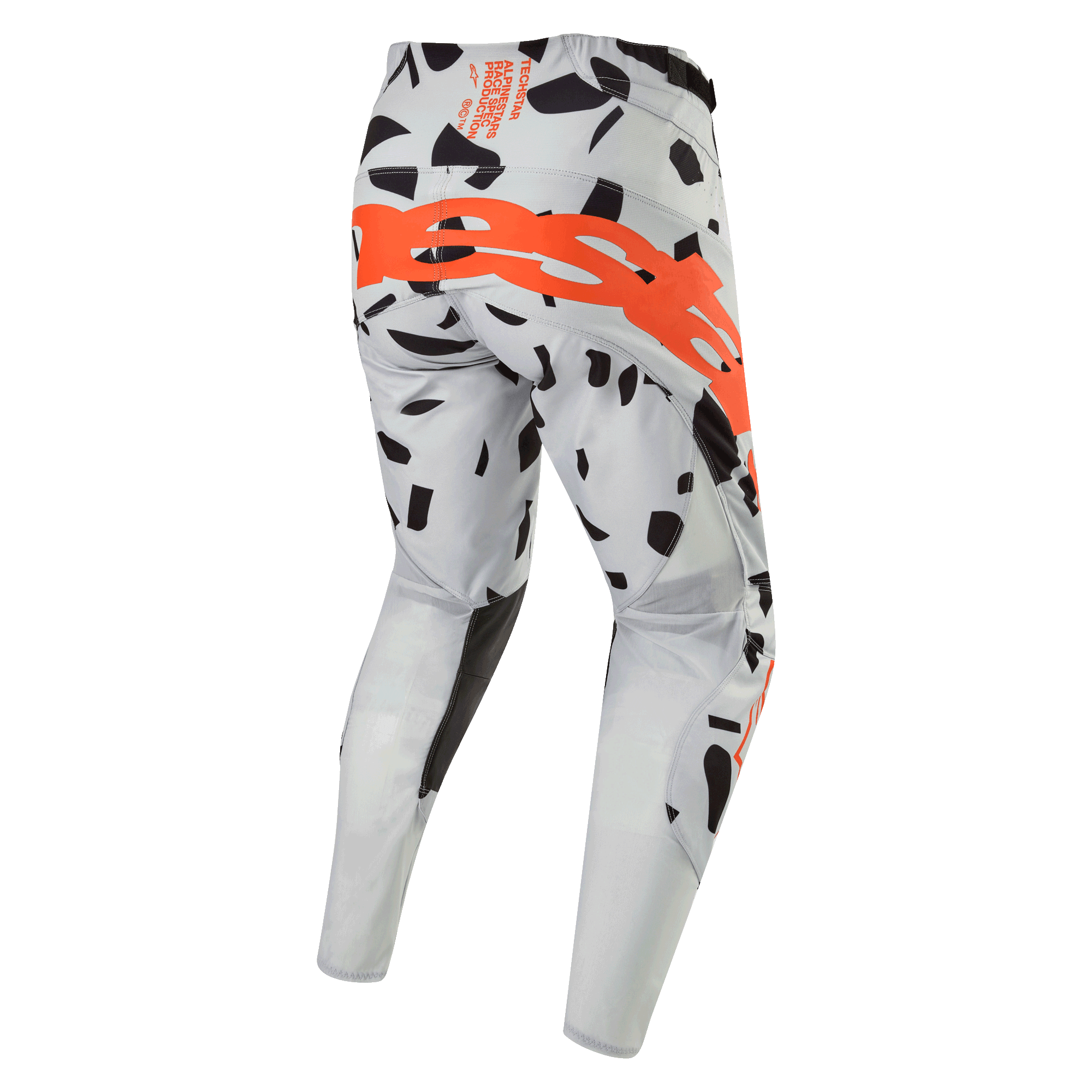 Alpinestars Techstar Rantera Pants 2024, spodnie motocrossowe, kolor Haze Gray Camo, widok z tyłu z dużym pomarańczowym logo na siedzeniu, czarne wzory graficzne na szarym materiale, sportowy design do jazdy w terenie