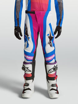 Alpinestars Spodnie Supertech Maven Młodzieżowe, spodnie motocrossowe, białe, koralowe i niebieskie, wyczynowy krój performance stretch, wytrzymała konstrukcja do jazdy terenowej