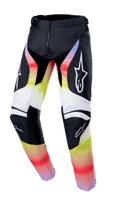 Alpinestars Youth Racer Semi Pants 2023, spodnie motocrossowe młodzieżowe, czarne z czerwono-żółto-białym gradientem, logo gwiazdy na udach i kolanach, techniczny design ze wzmocnioną ochroną kolan