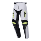 Alpinestars Youth 2024 Racer Lucent Pants, spodnie motocrossowe, białe, czarne i żółte fluo, logo gwiazdy na udach, czarne panele po wewnętrznej stronie nogawek i na kolanach, sportowy wstępnie zakrzywiony krój zapewniający wydajność motocrossową