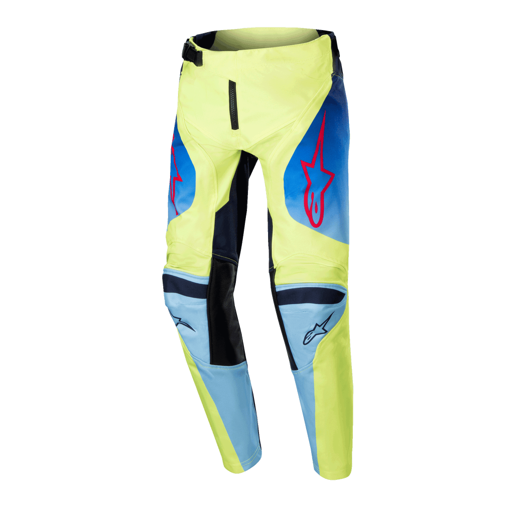 Alpinestars Youth Racer Hoen Pants 2024, spodnie motocrossowe młodzieżowe, żółte fluo i granatowe, czerwone logo gwiazdy Alpinestars, granatowe panele i czarne wzmocnienia na kolanach, sportowy design do jazdy terenowej