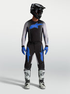 Alpinestars Supertech Hiten AFD Gear Set, męski zestaw odzieży motocrossowej, czarno-niebieska koszulka i spodnie o ergonomicznym kroju, profesjonalny sprzęt wyścigowy off-road