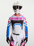 Alpinestars Koszulka Supertech Dyna, męska koszulka motocrossowa, biała i niebieska z różowymi akcentami, lekka oddychająca siatka stretch, wyczynowy krój wyścigowy.