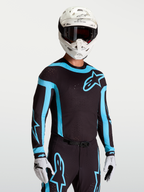 Alpinestars 2027 Supertech Vesta Jersey, Men's Motocross Racing Jersey in Black and Turquoise with ventilated mesh.