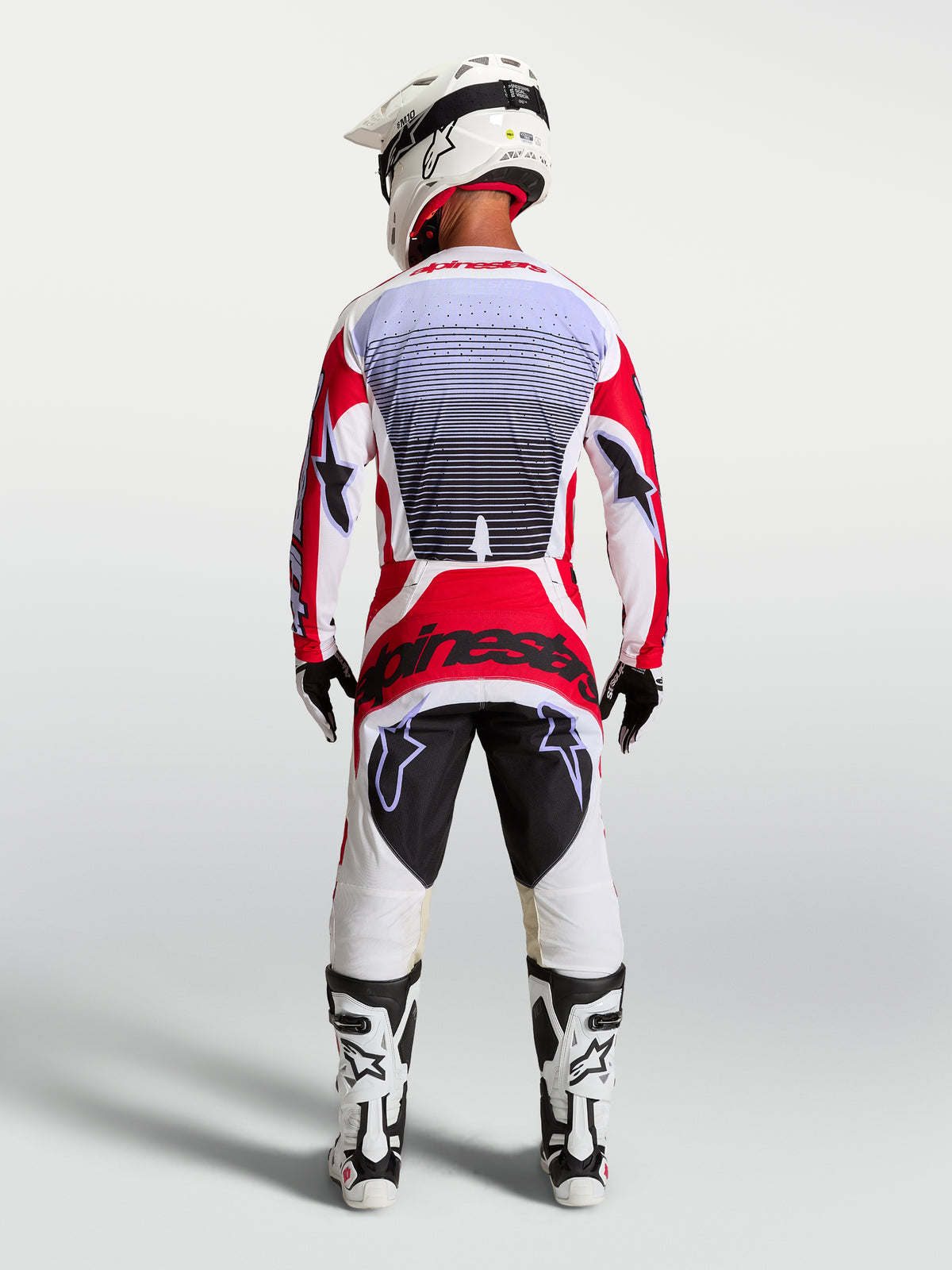 Alpinestars Techstar Maven, męski zestaw motocrossowy, czerwony i biały, sportowy krój, widok z tyłu.