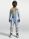 Alpinestars Techstar Maven, niebiesko-pomarańczowy męski zestaw motocrossowy, koszulka i spodnie o sportowym kroju.