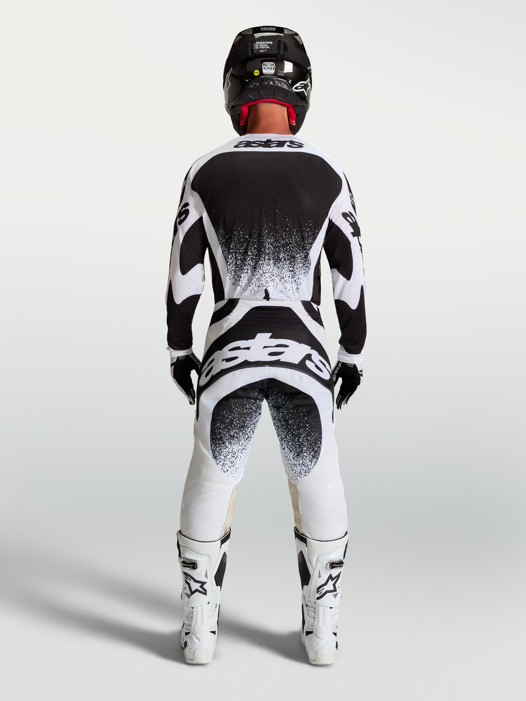 Alpinestars Techstar Swan, koszulka i zestaw motocrossowy męski, biały i czarny, z grafiką splatter na plecach.