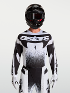 Koszulka Alpinestars Techstar Swan, męska koszulka motocrossowa, biała i czarna, sportowy krój z lekkiego elastycznego materiału, perforacje laserowe zapewniające wentylację