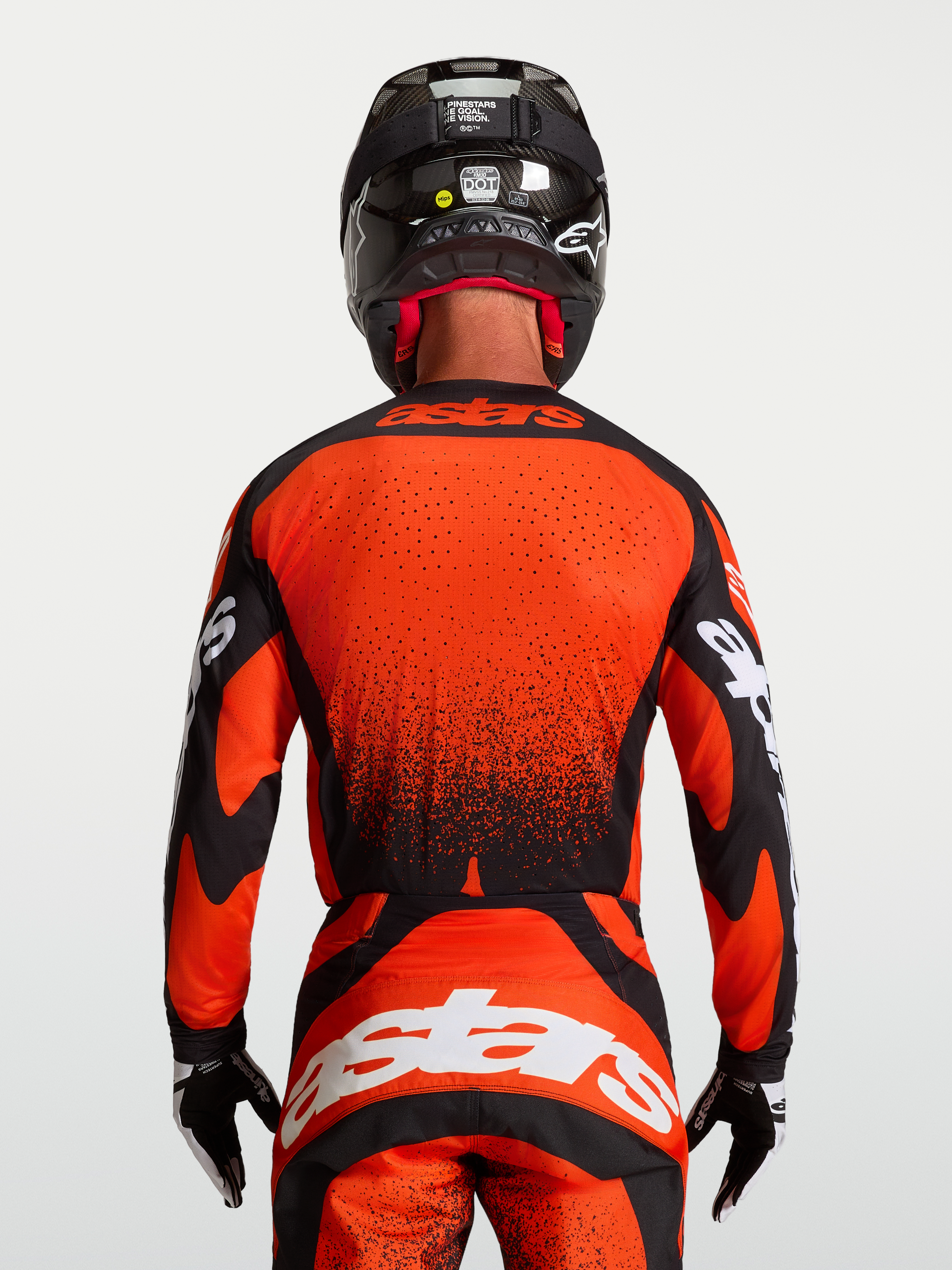 Alpinestars Techstar Swan Jersey, Red and Black Motocross Jersey, Mens On-Model Rear View, Extended Hem with Laser Perforations