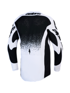Alpinestars Techstar Swan, czarno-biała męska koszulka motocrossowa z wentylacją na plecach i przedłużonym tyłem.