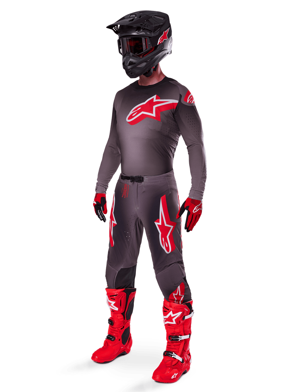 Alpinestars 2025 Supertech Lipan Gear Set, full motocross racing outfit, dark gray and red jersey with large star logo, matching pants with red accents and star graphics, red gloves, and bright red boots with white buckles, including a matte black helmet with red goggles.