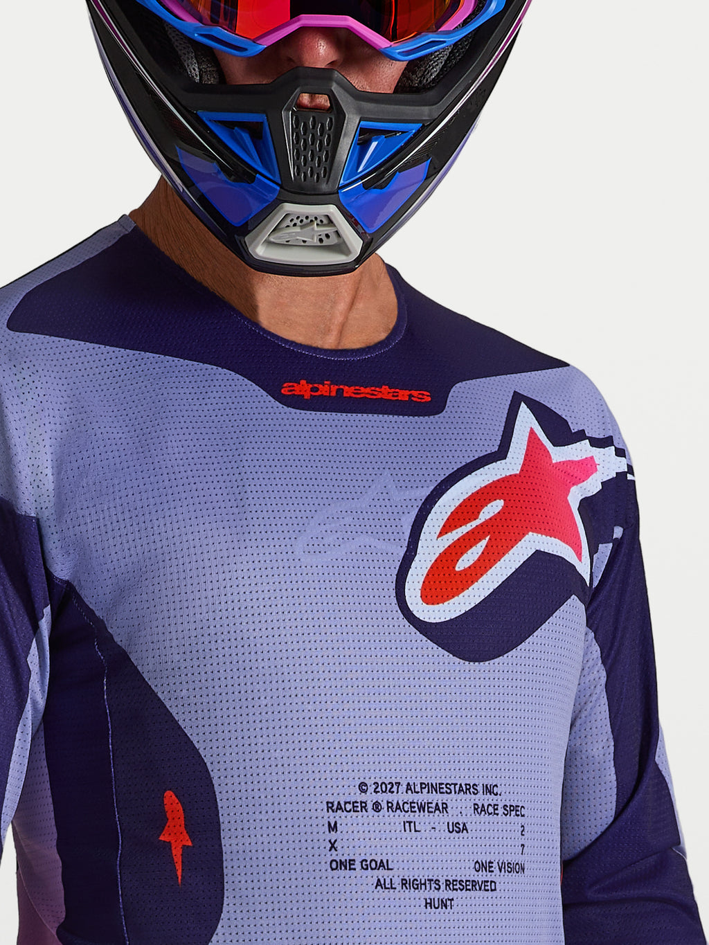 Koszulka Alpinestars Racer Air Hunt, fioletowa i jasnofioletowa siatkowa koszulka motocrossowa z dużym czerwonym logo Astars.