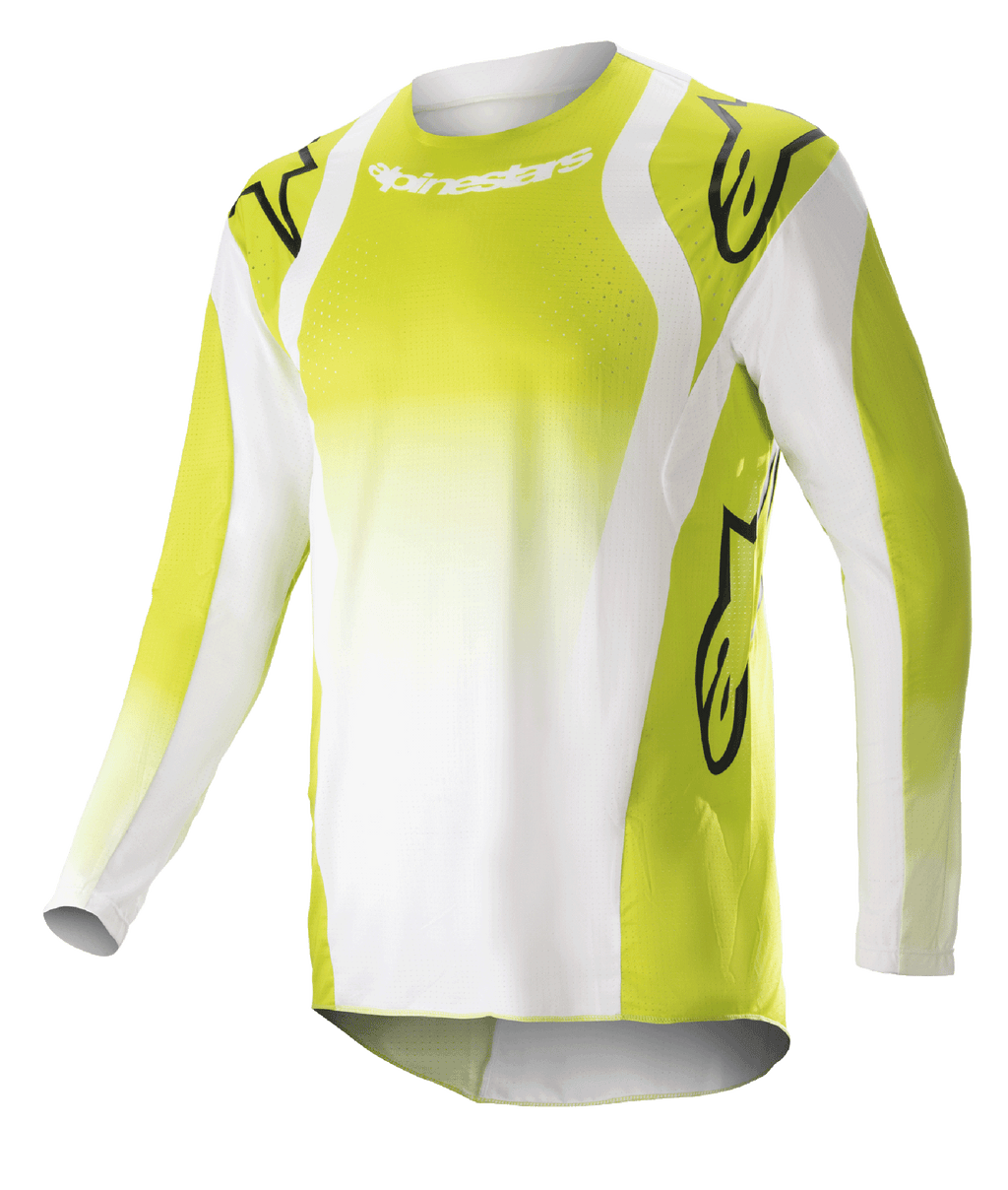 Alpinestars 2023 Techstar Push Jersey, koszulka motocrossowa z długim rękawem, żółta fluo i biała, duże czarne logo Astars na ramionach i rękawach, perforowany materiał techniczny, okrągły dekolt, przedłużony tył do wyścigów off-road