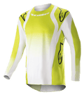 Alpinestars 2023 Techstar Push Jersey, koszulka motocrossowa z długim rękawem, żółta fluo i biała, duże czarne logo Astars na ramionach i rękawach, perforowany materiał techniczny, okrągły dekolt, przedłużony tył do wyścigów off-road