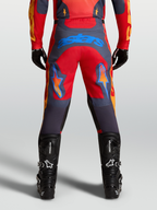 Alpinestars Spodnie Racer Hunt, męskie spodnie motocrossowe, czerwone i szare, niebieskie logo Astars, widok od tyłu