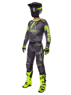 Zestaw Alpinestars 2025 Racer Hollow, kompletny strój motocrossowy, szary kamuflaż i neonowy żółty, zawiera koszulkę, spodnie, pasujący czarno-żółty kask, gogle, rękawice i jaskrawożółte buty, wysokowydajny sprzęt wyścigowy off-road