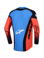 Alpinestars Techstar Knif Jersey 2026, koszulka motocrossowa, widok z tyłu, kolory pomarańczowy, czarny i UCLA Blue, niebieski panel tylny z białym logo gwiazdy, czarne panele boczne z brandingiem „astars”, pomarańczowe rękawy z czarnymi akcentami, lekka odzież wyczynowa do wyścigów off-road