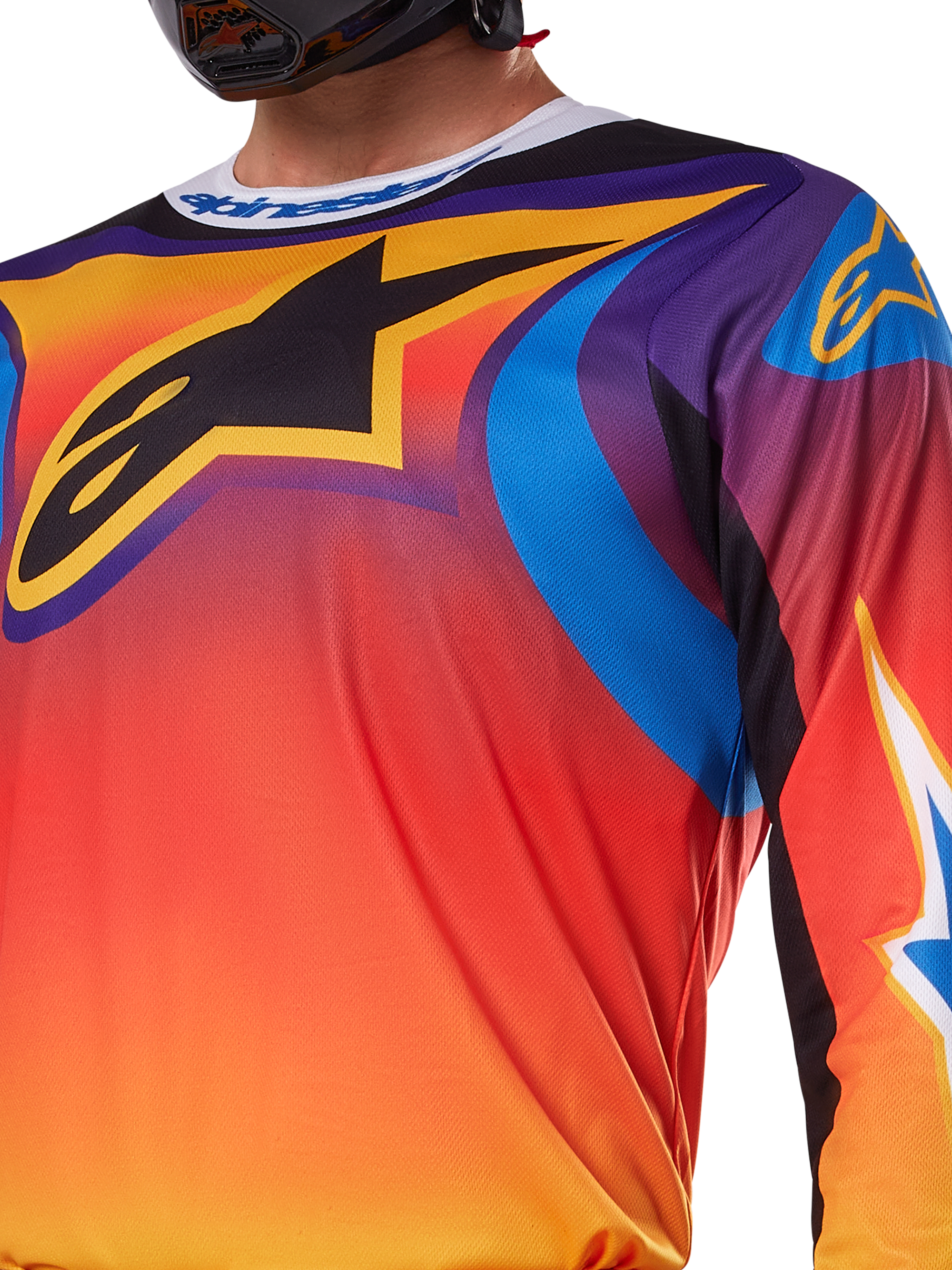 Alpinestars 2025 Fluid Wurx Jersey, wielokolorowy biało-pomarańczowy design, koszulka motocrossowa z długim rękawem, swobodny krój sportowy, odprowadzająca wilgoć polifabryka zapewniająca wydajność w terenie