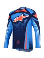 Alpinestars 2026 Techstar Nomur Jersey, koszulka motocrossowa, ciemnogranatowa i błękitna z pomarańczowymi akcentami, z dużym białym logo Astars na piersi i białymi ukośnymi pasami na długich rękawach, lekki sportowy krój wyścigowy