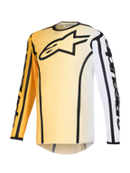 Alpinestars 2026 Fluid Apex Jersey, koszulka motocrossowa, żółto-biały gradient z czarnymi akcentami, duże czarne logo z gwiazdą na piersi, wyraźne czarne kontury wzdłuż szwów, branding Alpinestars na rękawach, techniczna koszulka z długim rękawem do jazdy terenowej
