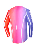 Alpinestars 2026 Fluid Apex Jersey, widok z tyłu, wielokolorowy gradient w odcieniach różu, fioletu i pomarańczu, białe zakrzywione lamówki i przedłużony tył, profesjonalna odzież motocrossowa i off-road