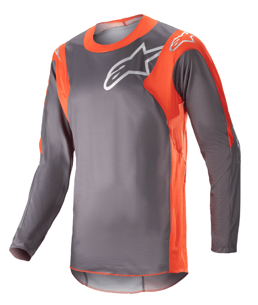 Alpinestars 2023 Racer Hoen Jersey, koszulka motocrossowa z długim rękawem, szara z jaskrawopomarańczowymi elementami, białe logo Alpinestars na klatce piersiowej i ramionach, lekka tkanina techniczna do wyścigów terenowych