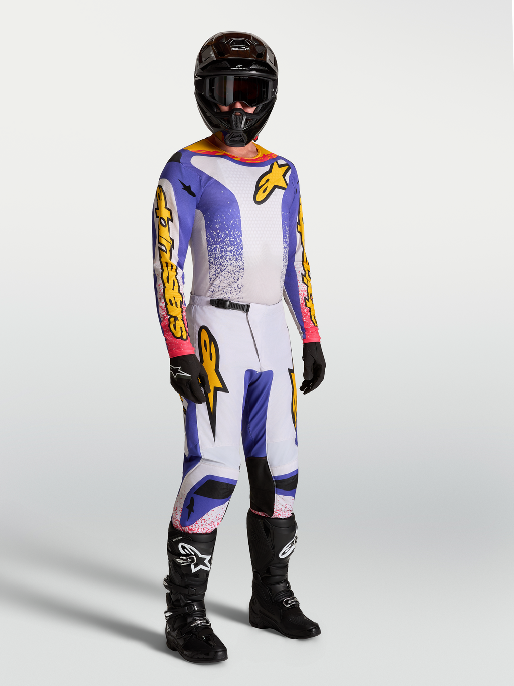 Alpinestars Fluid Drag Gear Set i spodnie Fluid Drag, męski zestaw motocrossowy, liliowy, niebieski i złoty, na modelu