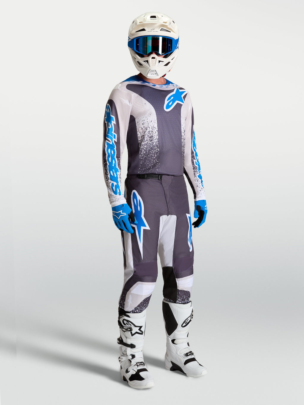 Alpinestars Fluid Drag Gear Set, męski zestaw do motocrossu, szary i niebieski komplet z koszulką i spodniami.
