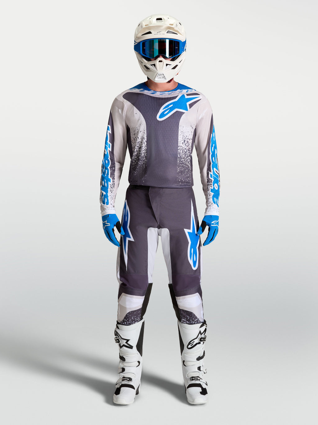 Alpinestars 2027 Fluid Drag Gear Set, szary i niebieski zestaw odzieży motocrossowej, wyścigowa koszulka i spodnie.