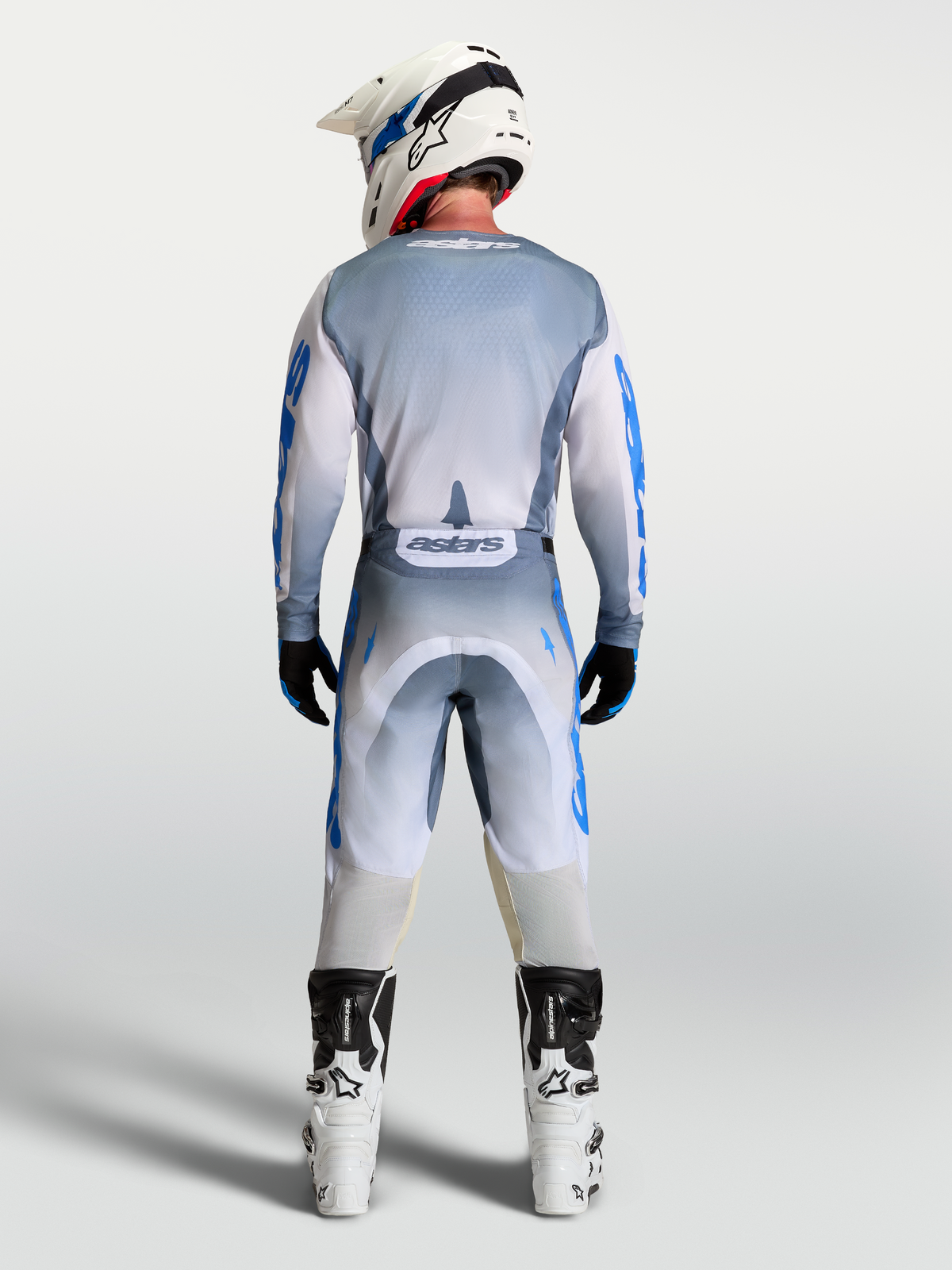 Spodnie Alpinestars Racer Amber i Racer Amber Gear Set, męski strój motocrossowy, szary i niebieski, widok z tyłu.
