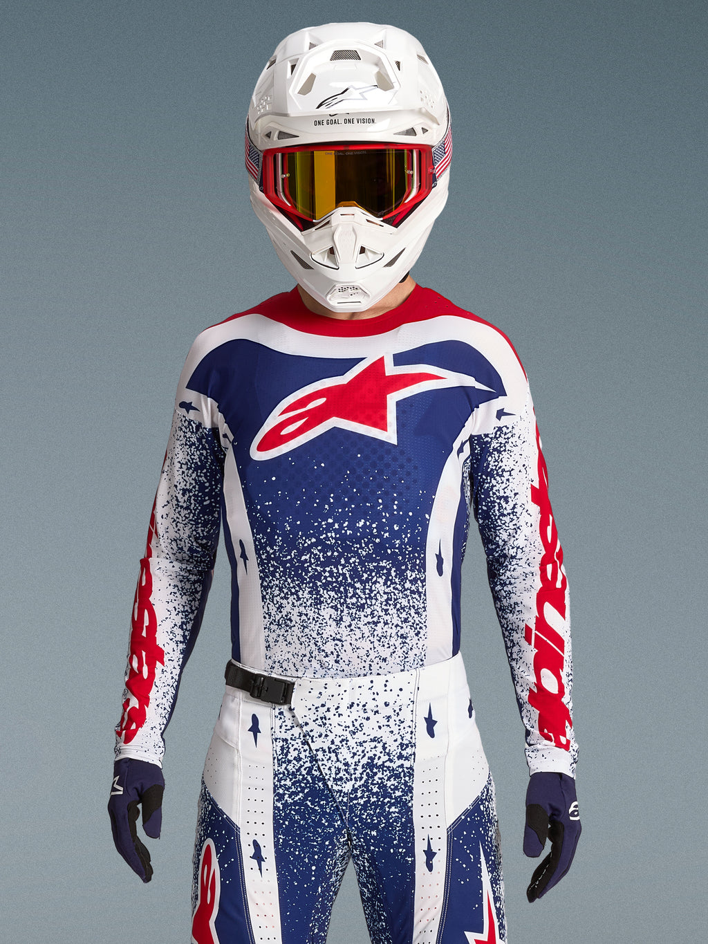 Alpinestars Techstar Unity, męska koszulka motocrossowa, czerwona, biała i niebieska, edycja limitowana o kroju wyścigowym.