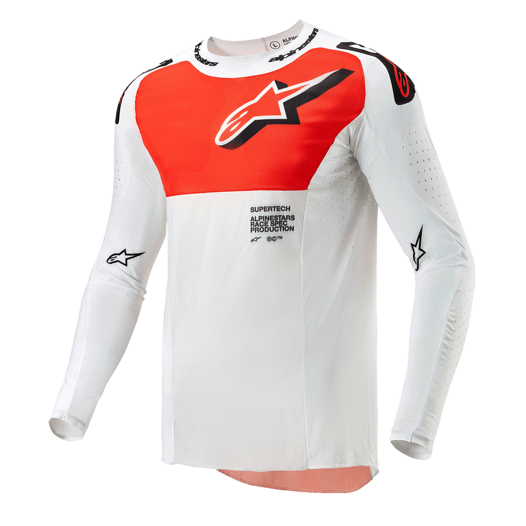 Alpinestars 2024 Supertech Ward Jersey, koszulka motocrossowa, biała i intensywnie pomarańczowa, techniczna góra z długim rękawem, duża pomarańczowa grafika na klatce piersiowej, logo z gwiazdą, oddychająca perforowana konstrukcja do wyścigów off-road