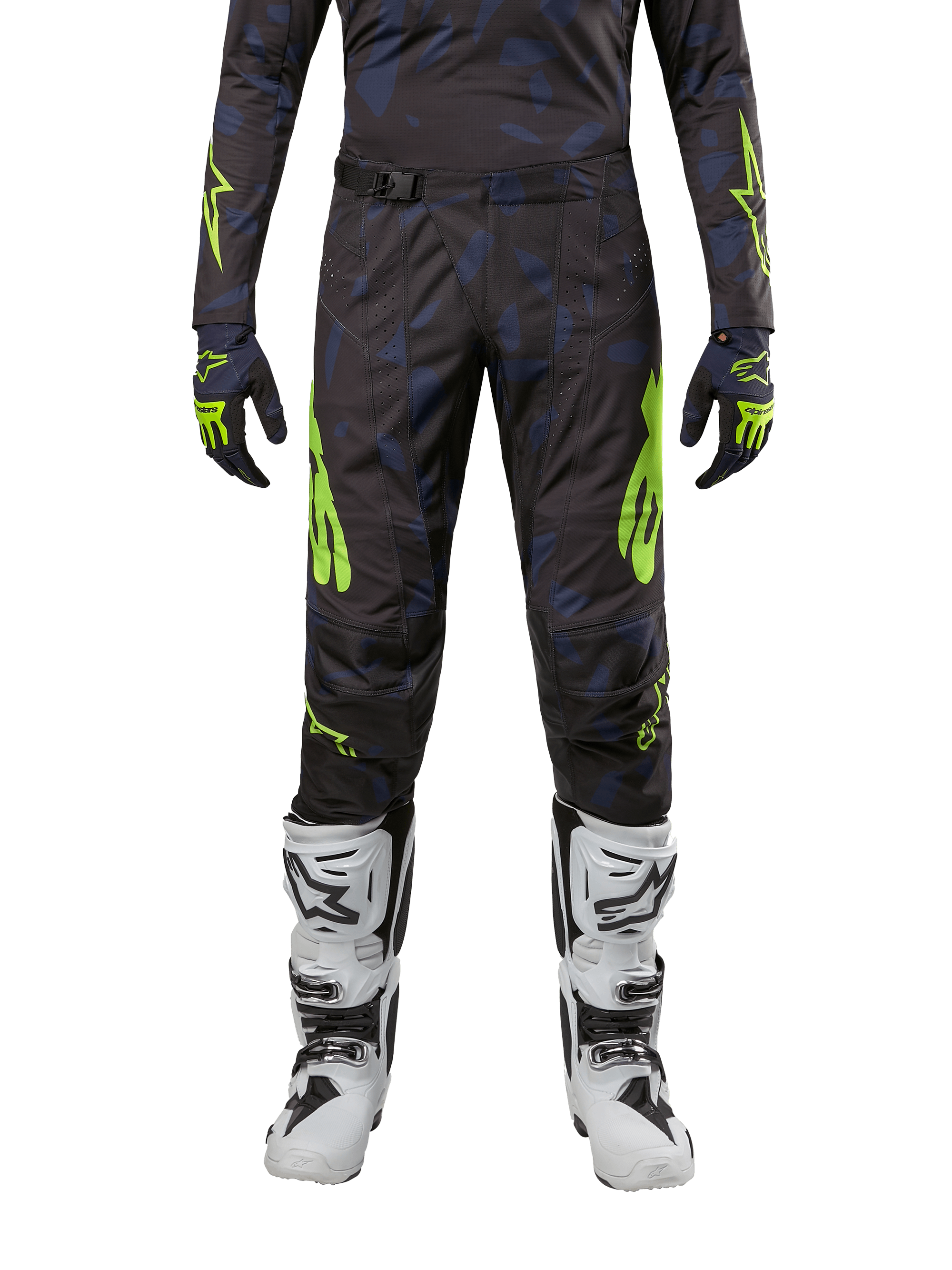 Alpinestars Techstar Rantera Pants 2024, spodnie motocrossowe, czarno-granatowe z jaskrawym żółtym (Yellow Fluo), noszone z pasującą koszulką z długim rękawem, rękawicami i białymi butami motocrossowymi, z wyraźnymi neonowożółtymi akcentami i abstrakcyjnym ciemnym wzorem.