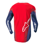 Alpinestars Techstar Pneuma Jersey 2024, koszulka motocrossowa, czerwona, niebieska i biała, widok z tyłu prezentujący faliste grafiki na rękawach, biały napis Alpinestars na ramionach oraz logo Astar w dolnej części pleców, ergonomiczny krój do jazdy off-road
