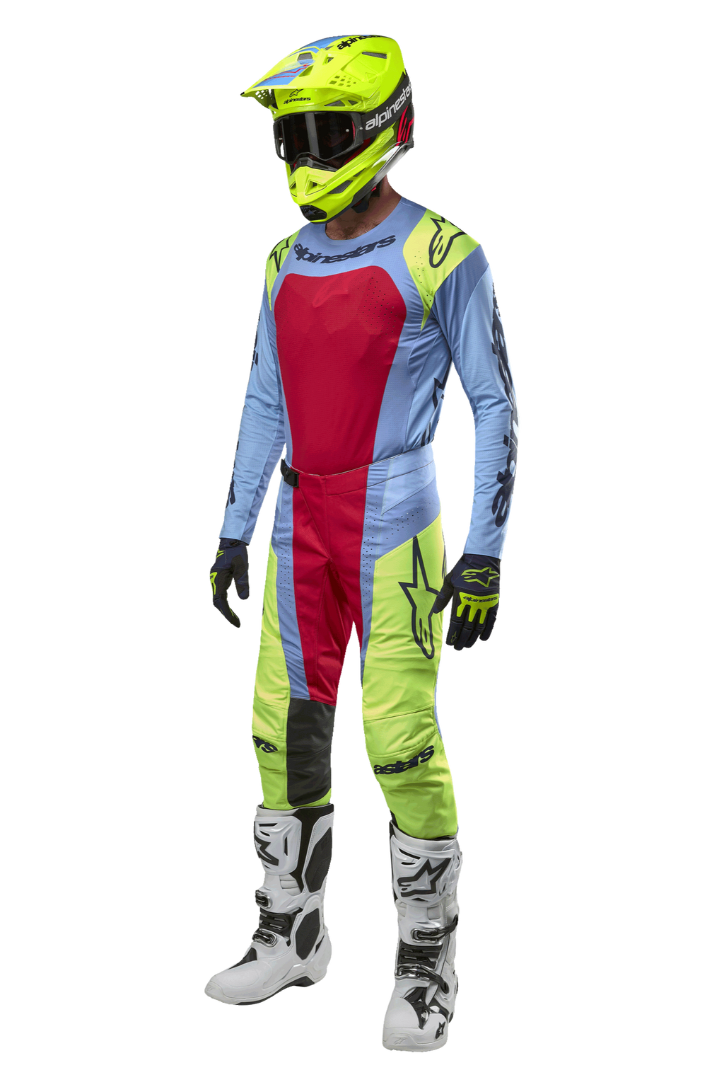 Zestaw odzieży i koszulka Alpinestars Techstar Ocuri 2024, zawodnik motocrossowy w stroju jasnoniebieskim, neonowym żółtym i czerwonym, neonowy żółty kask, pasujące spodnie i białe buty, profesjonalny komplet wyścigowy off-road